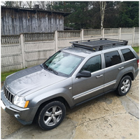 Bagażnik dachowy JEEP Grand Cherokee WK, gen. 3 od 2005 do 2010 r., z siatką